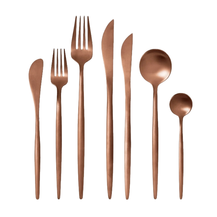 A modern flatware set of forks, knives, and spoons in a rose gold finish.