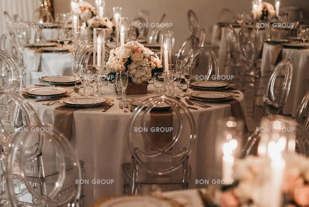 Modern glam table setting with clear acrylic chairs