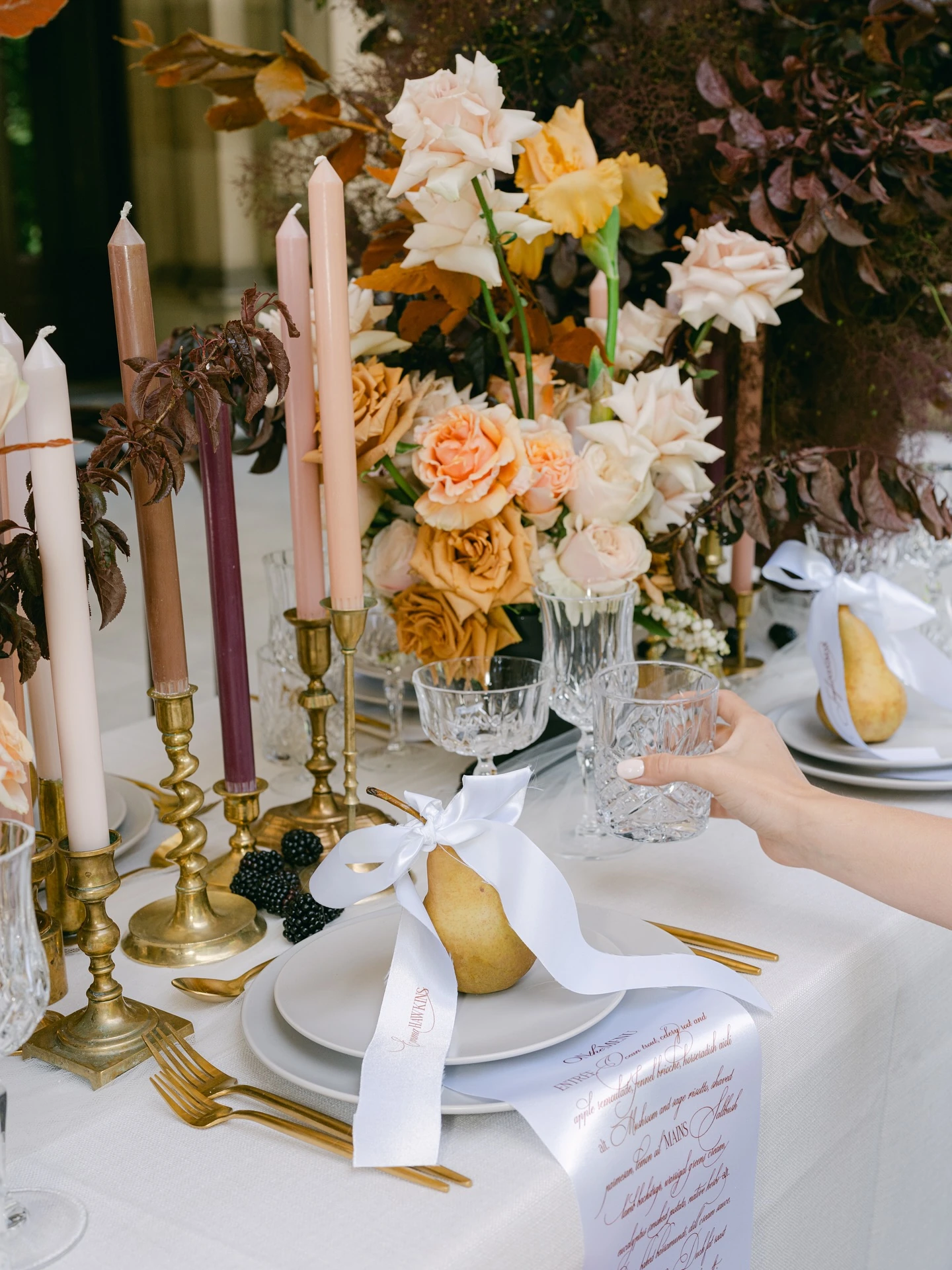 Elegant Feast Setup with Crystal Glassware, Goldware and Themed Table Accents