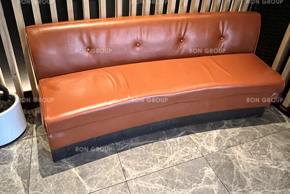 RON GROUP x COSMO Custom Waiting Area with Semi-Private Curved Leather Sofas